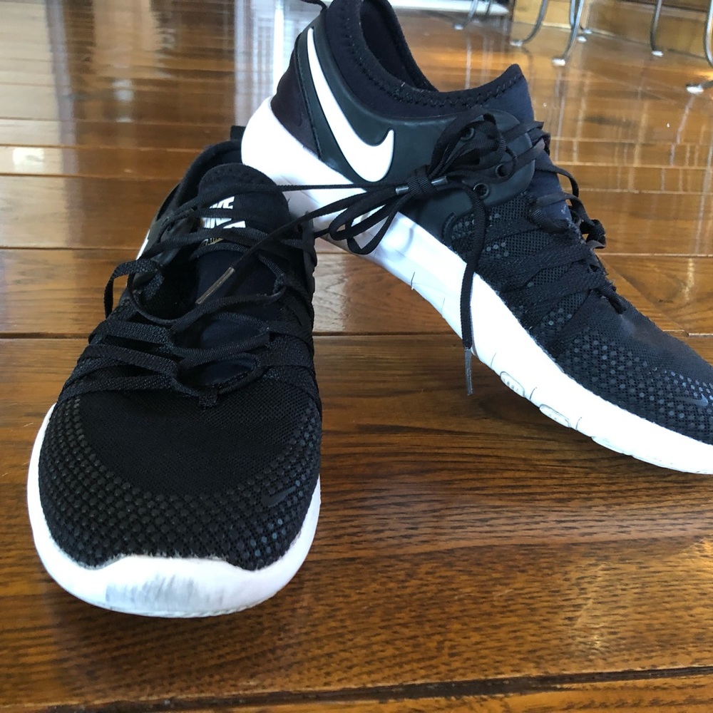 Nike Free black & white training tennis shoes.